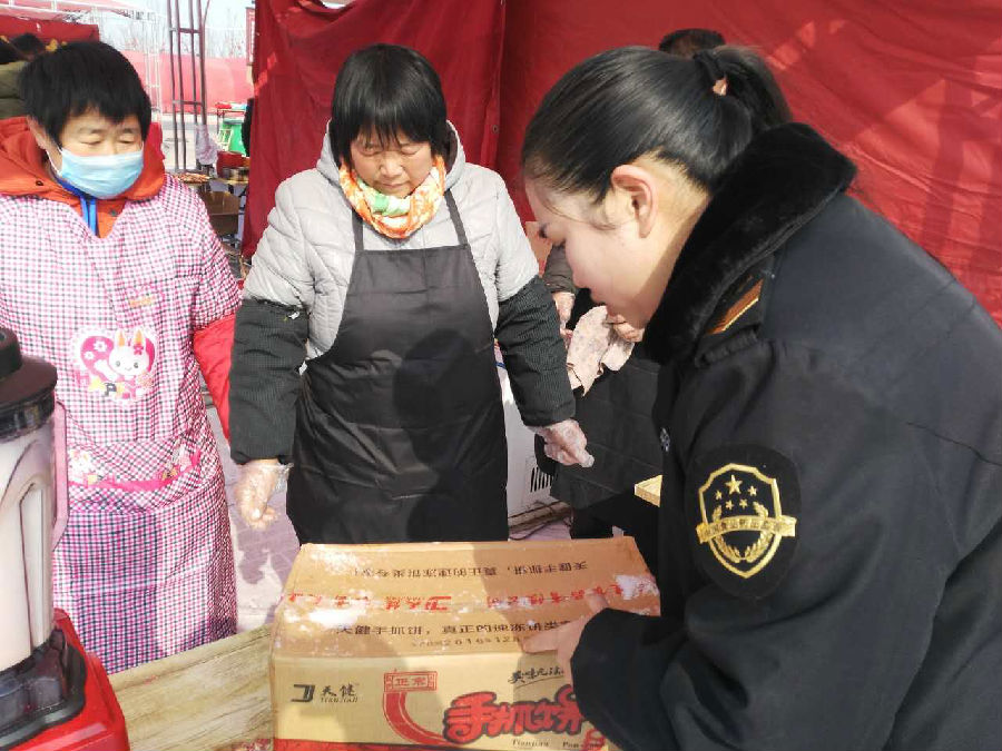 0128中牟县春节庙会食品安全检查1.png